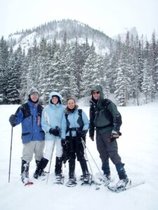 Group of snowshoers on a guided tour in rocky mountain national park